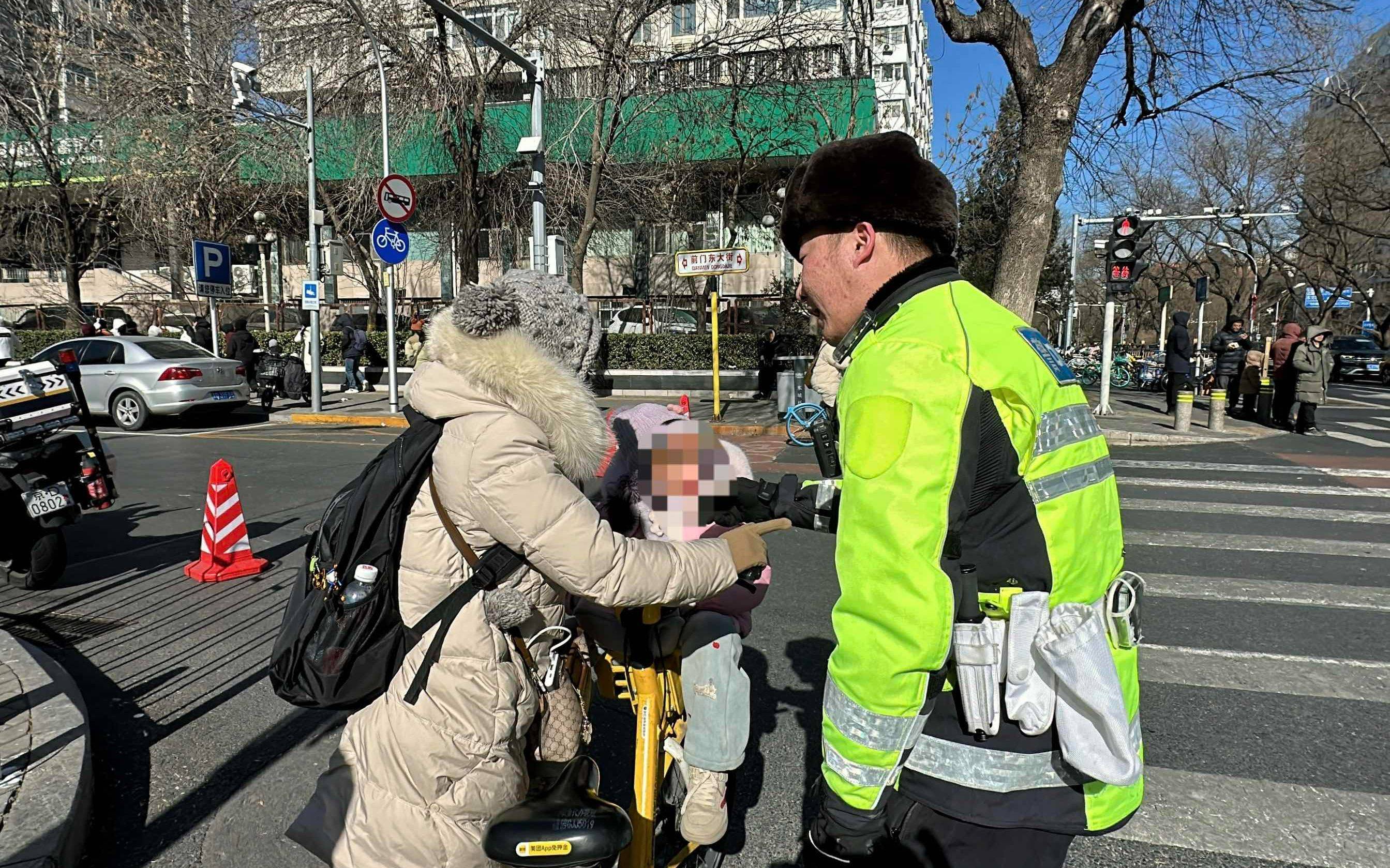 记者探访｜严寒大风中<strong></p>
<p>BitMart</strong>，北京交警调整信号灯时长减少行人等待时间