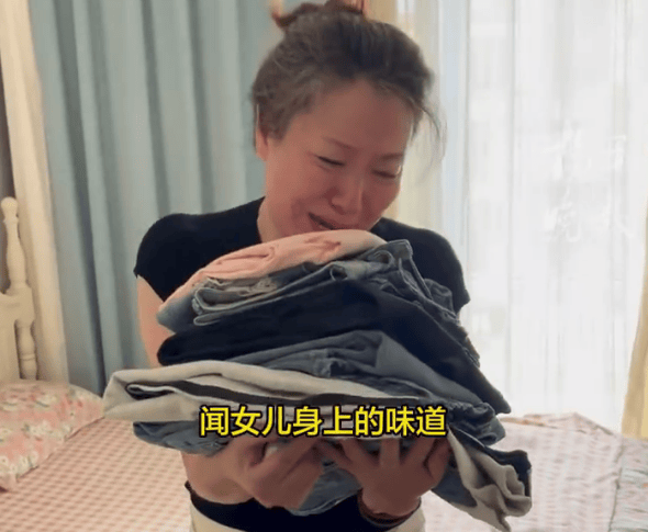 “女儿的衣服我不舍得洗<strong></p>
<p>币安币交易所</strong>，偶尔想回来闻一闻她的味道”